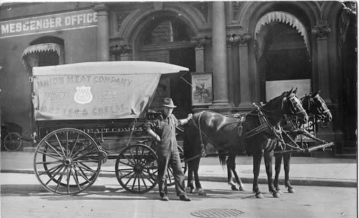 Union Member on film set with horse drawn carriage